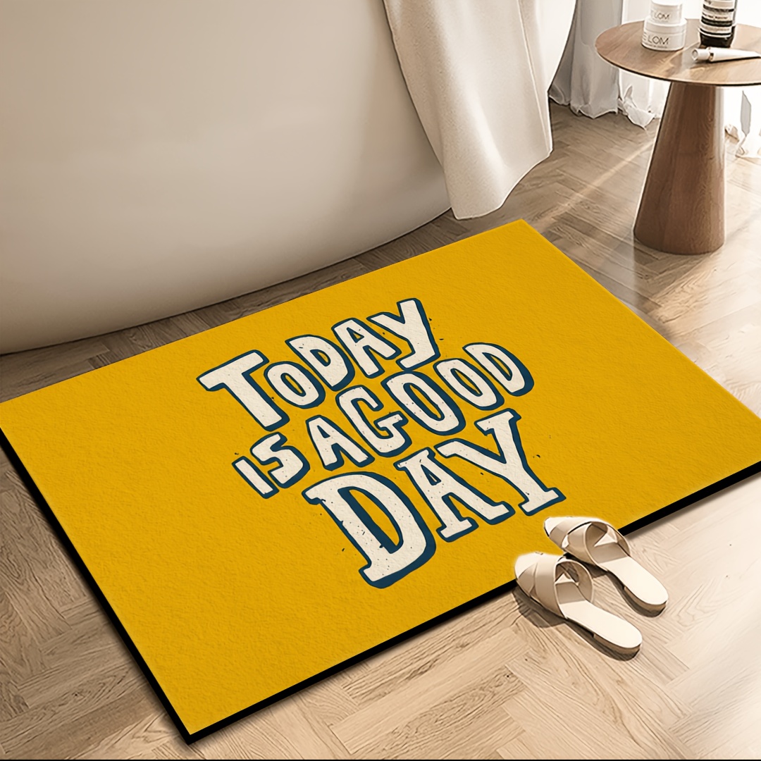 Tappetino giallo con scritta 